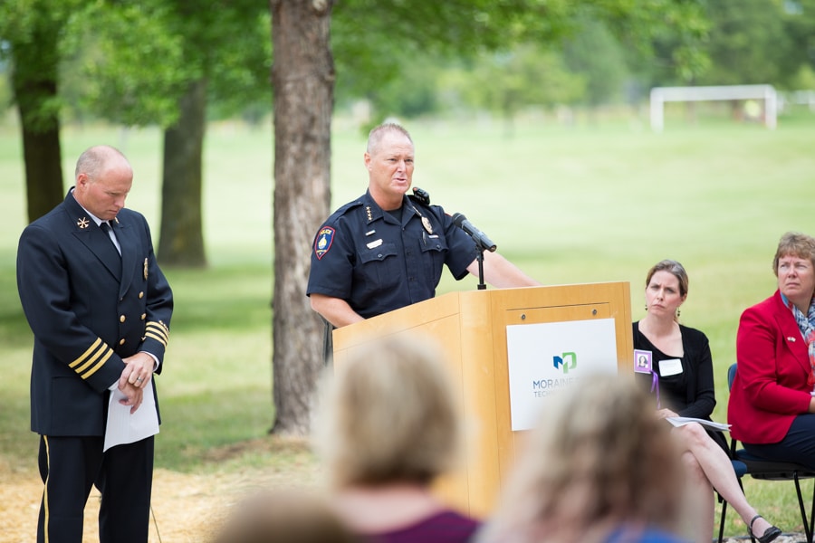 Two officer speaking at 9-11 Memorial Rededication ceremony