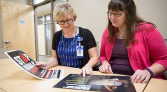 Anne Lemke and Katie Gindt review Traffic Free Zone posters