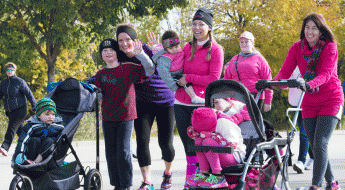 Moms, strollers, and kids at Pink Pumpkin walk/run