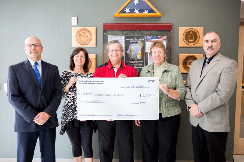 Moraine Park Foundation donation $2,000 donation check from donor Tom Heffron