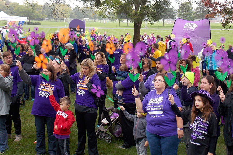 group of people in purple shirts at alzheimer walk at moraine park