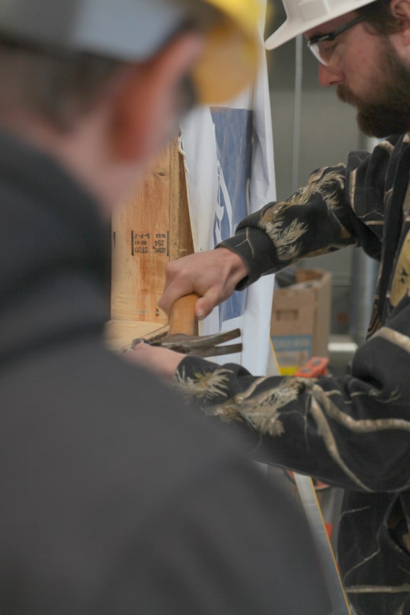 Apprentices work on building for veterans