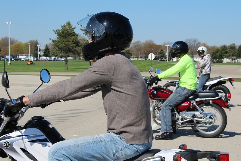 students sit on motorcycles at moraine park