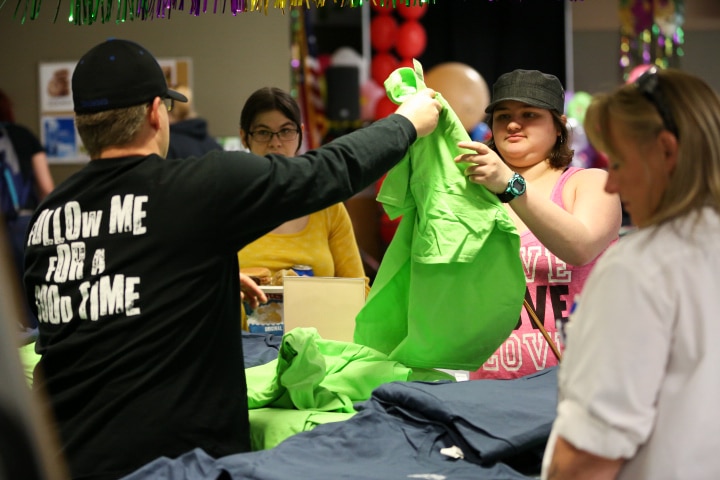 students hand out tshirts at last blast at moraine park