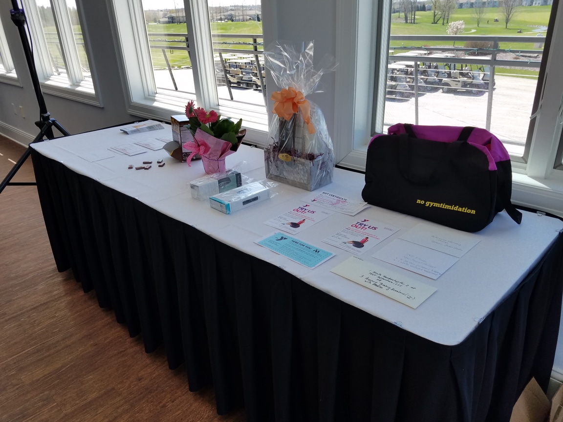 table display at Wisconsin Women in Higher Education Leadership event