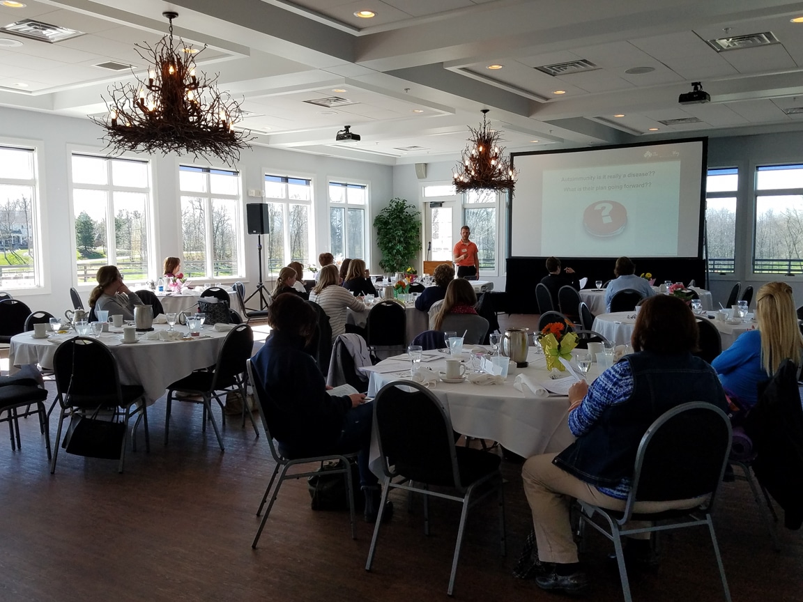 speaker gives presentation at mptc Wisconsin Women in Higher Education Leadership banquet