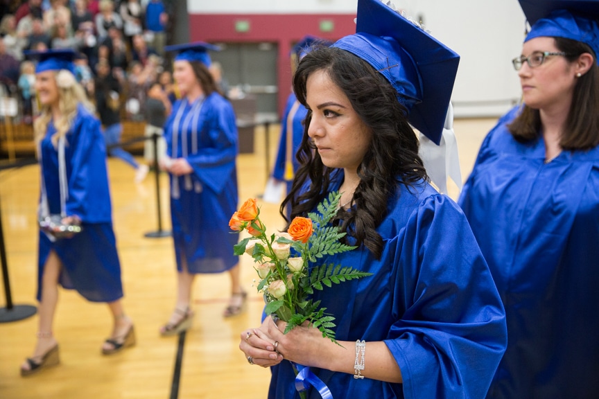 Graduates march in together at Moraine Park commencement ceremony