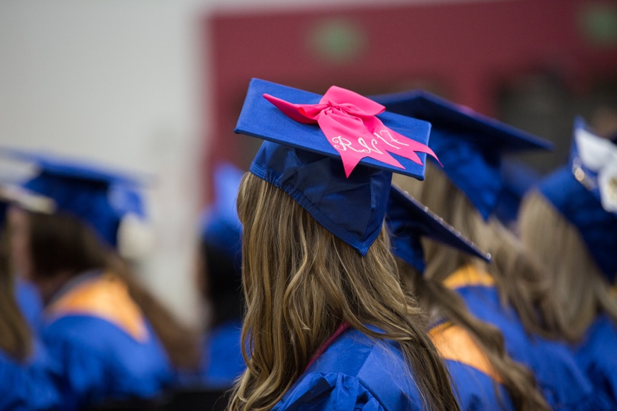Pink bow on graduate cap