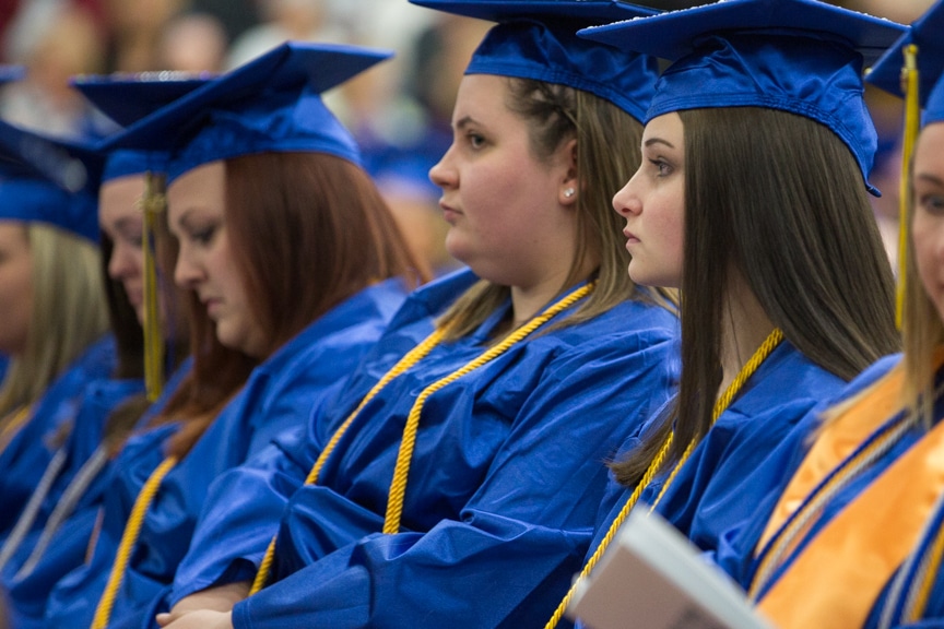 Female graduates sit in rows at Moraine Park commencement ceremony