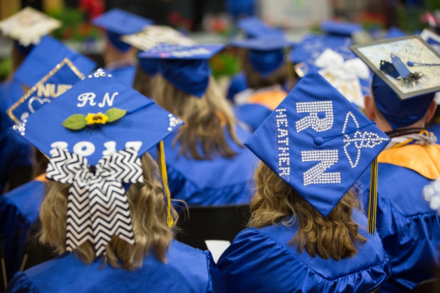 Top of graduate caps that have RN decorations