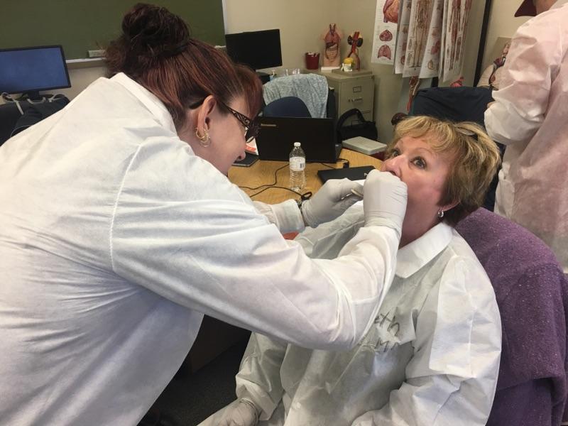 medical assistant students do oral exam