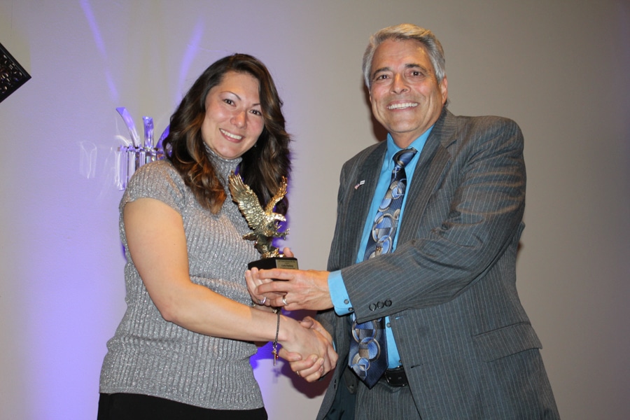 Carla Stephany accepted award from Dr. Stan Cram at Student Awards Banquet