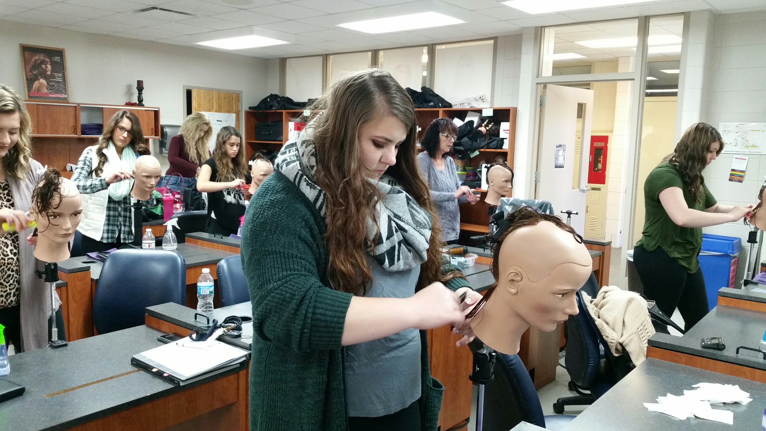 cosmetology students working in moraine park classroom 