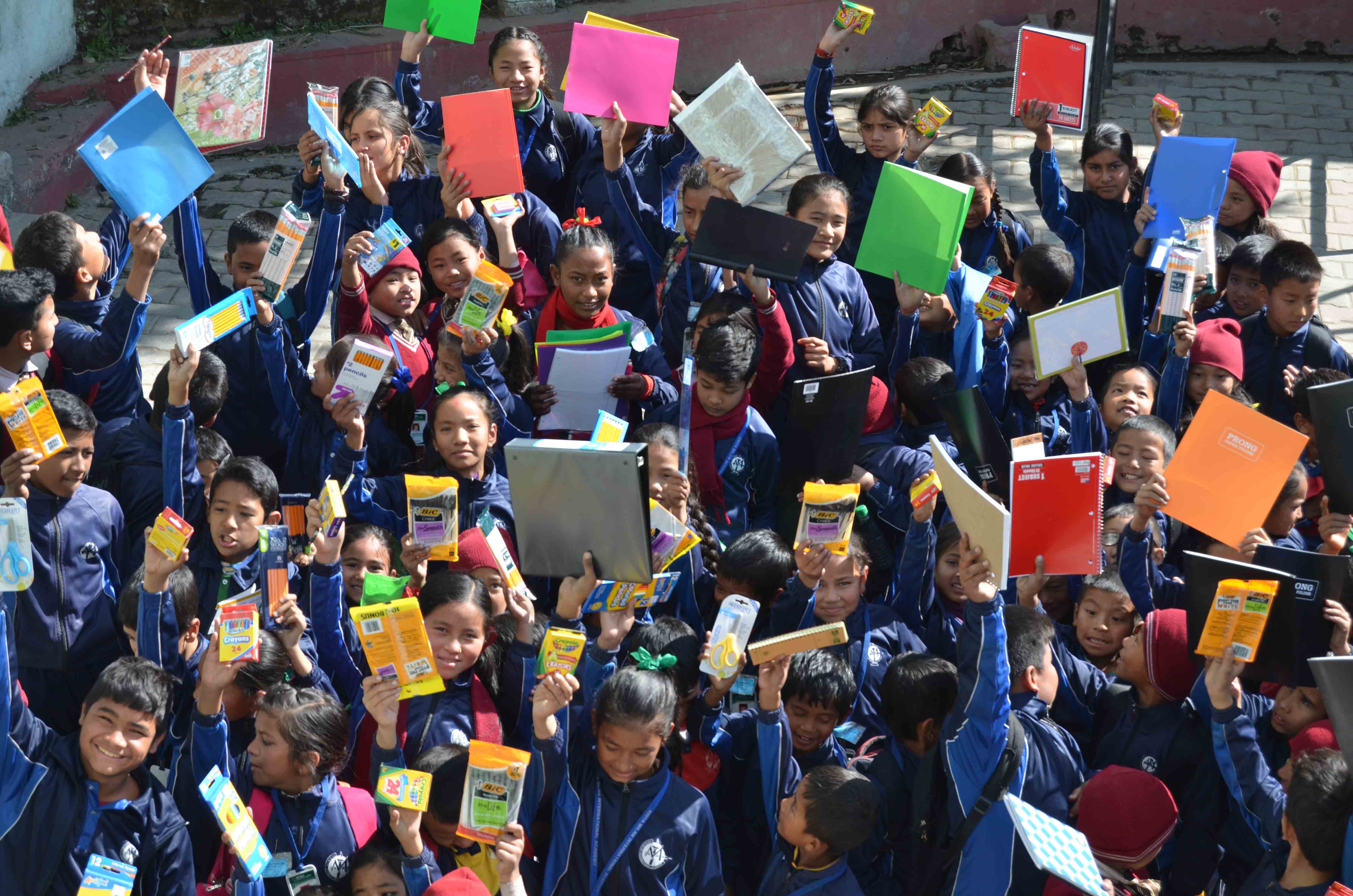 Nepal students celebrate gifts of school supplies