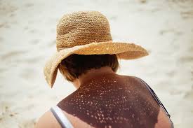 women in sun hat