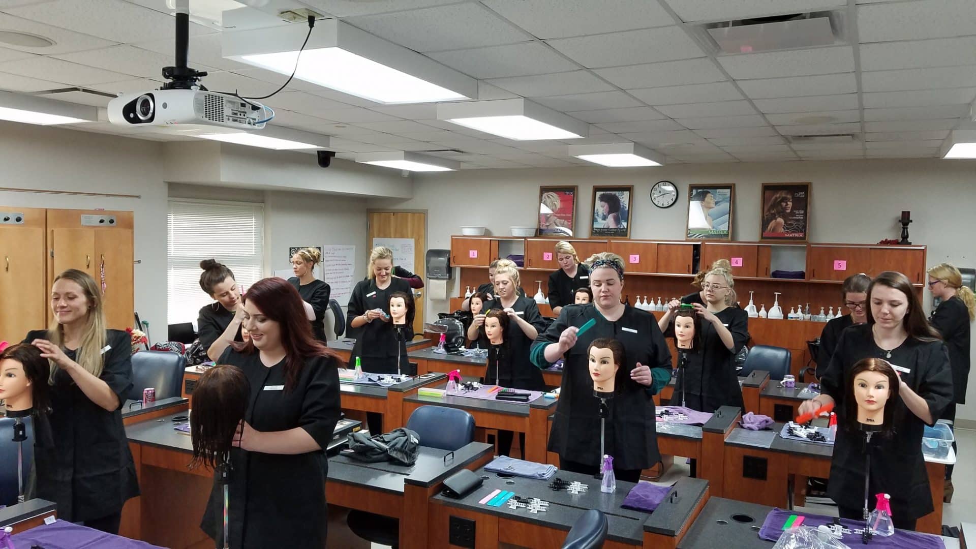 Cosmo students testing on manikin heads