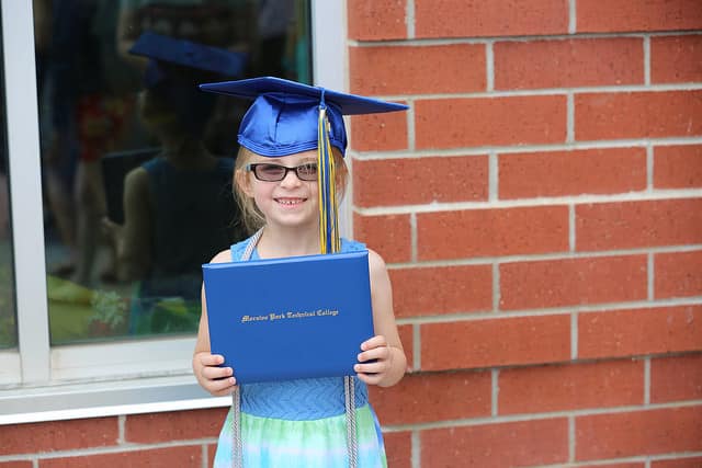 child at graduation