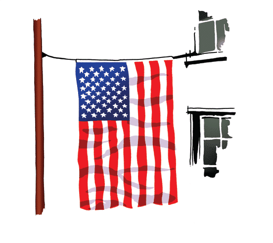 American flag hung over street
